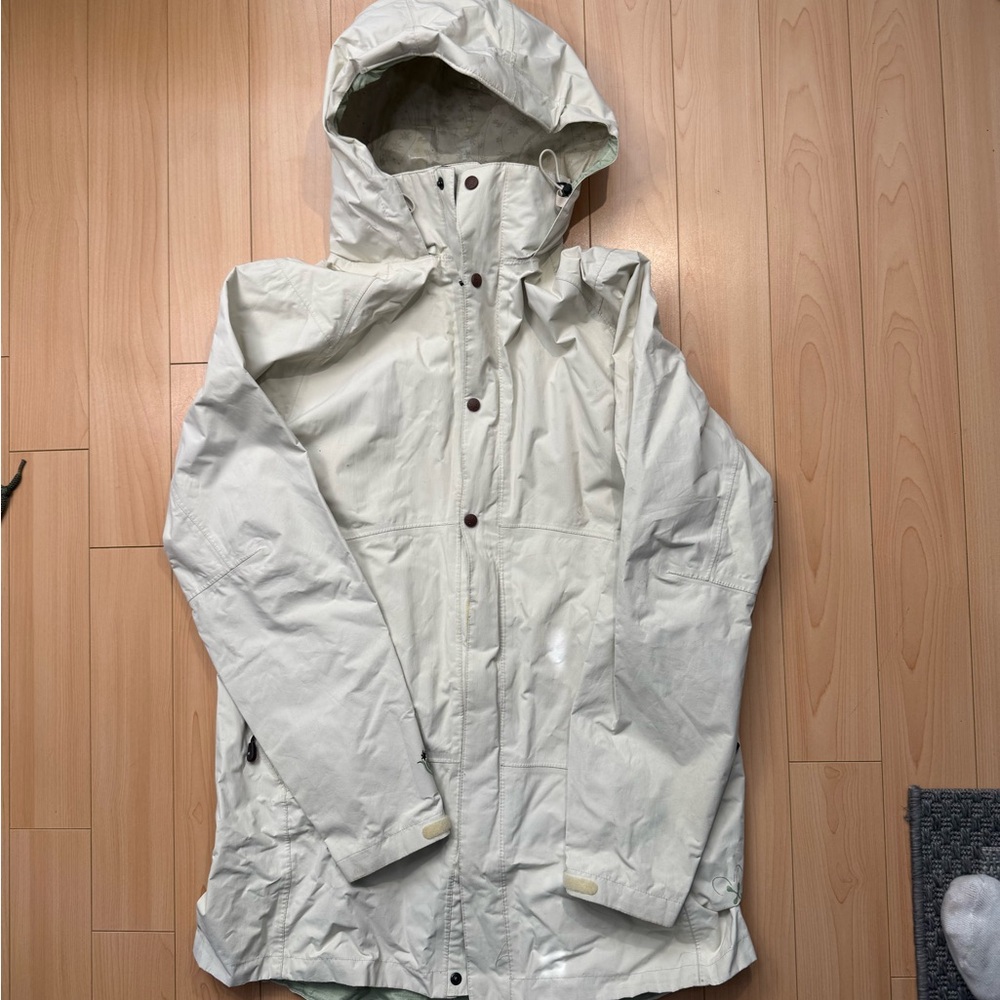 White/cream Hooded rain raJacket